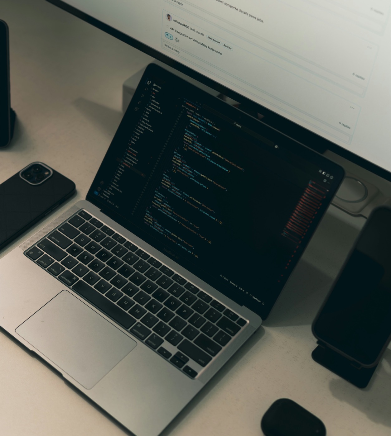 Developer workspace with code editor and project planning screen